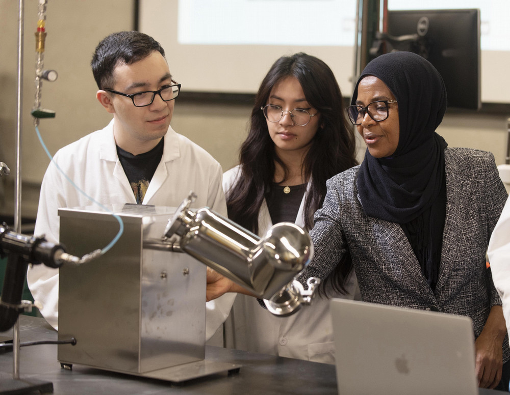 Scientists collaborating in a lab