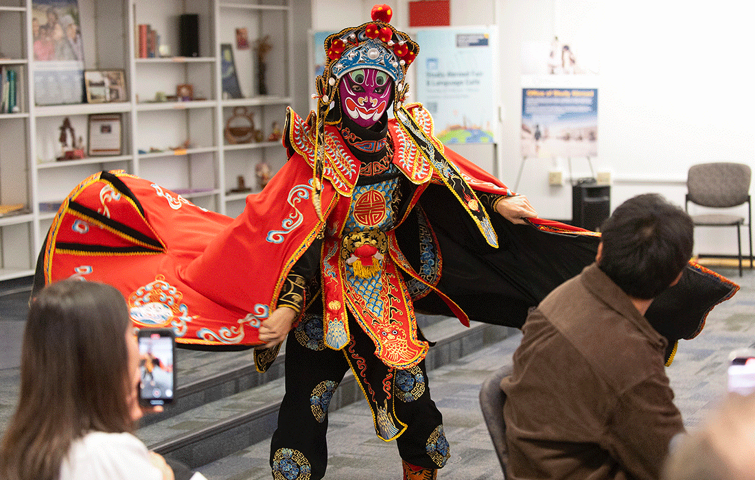 Magic Mask dancer at the Global Campus Open House as part of International Education Week