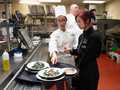 students working at the collins kitchen