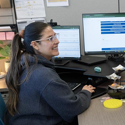 advisor sitting at desk