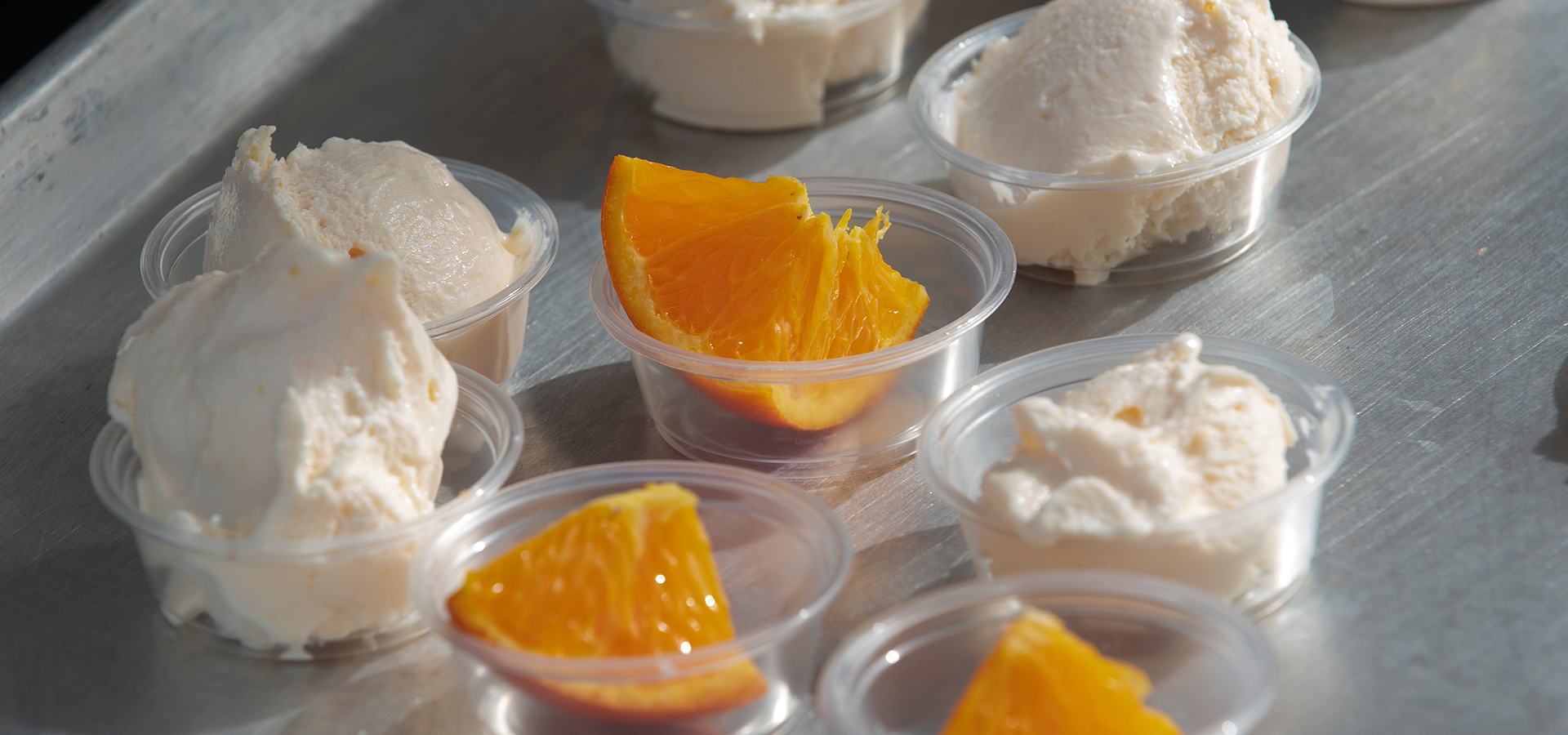 A tray of Satsuma orange ice cream samples in tiny cups