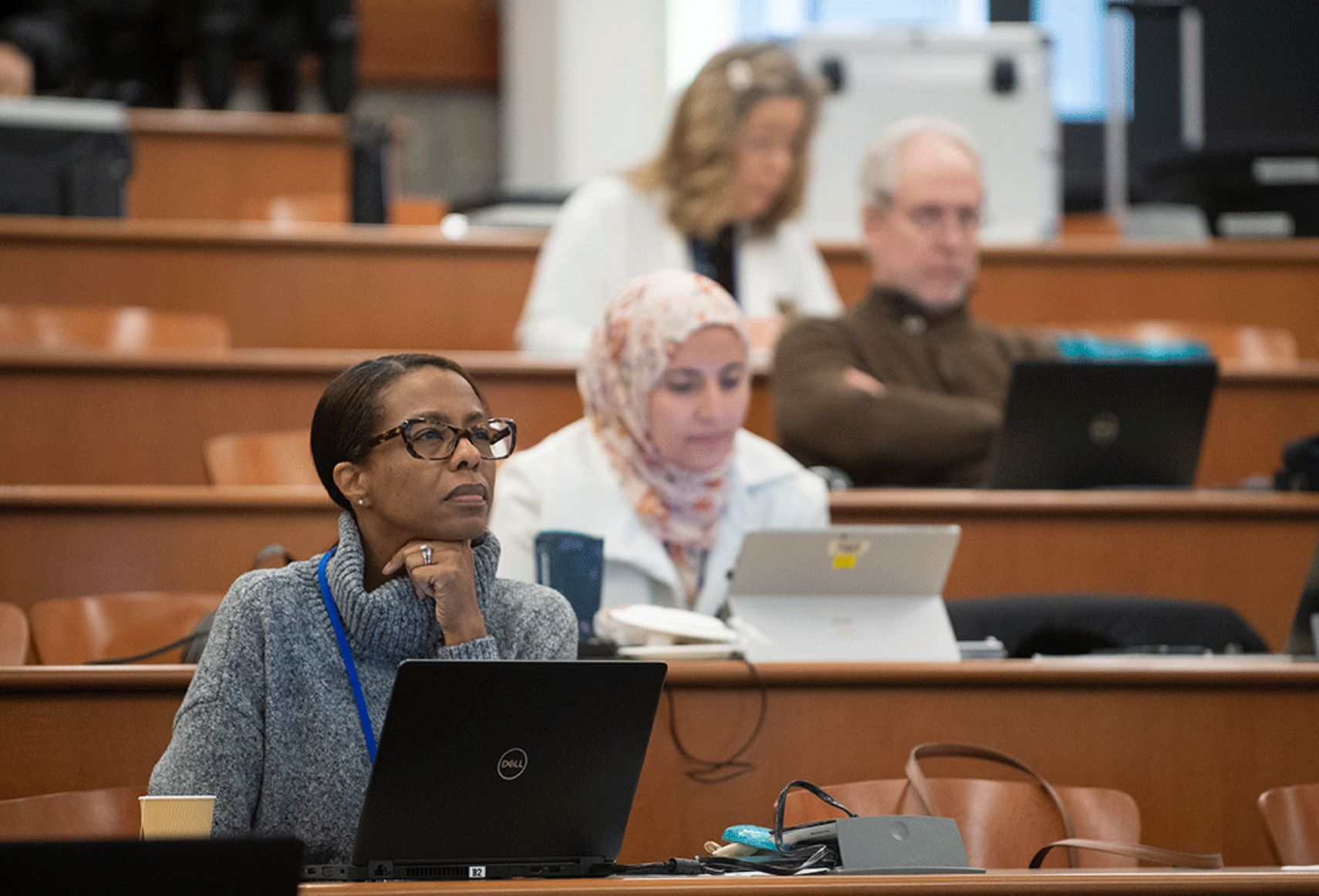 Attendee listening to Winter Institute 2023 Digital Badging talk.