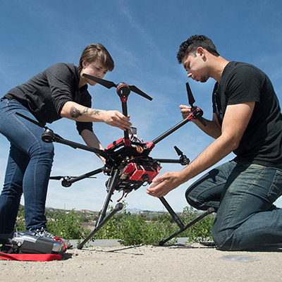 Students Holding Drone