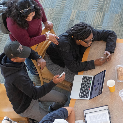 CPP students studying together in the library