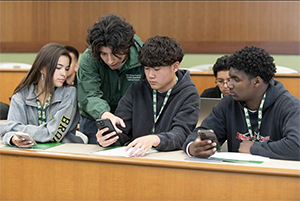 students in a group working on a project