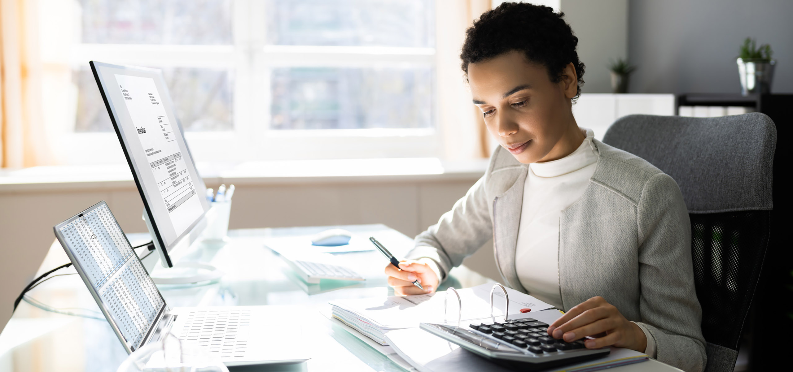 person working with a calculator