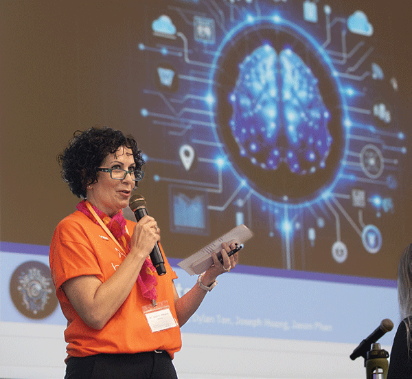 Dr. Laura Pohopien speaks  at the Artificial Intelligence Fair at Cal Poly Pomona April 17, 2024.