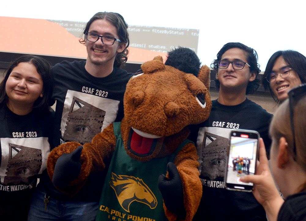 student volunteers posing for a social media photo