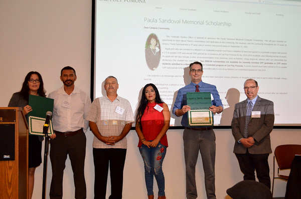 recipients of scholarship pose in a group