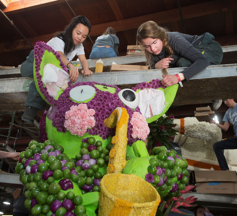 Two students working on Rose Float