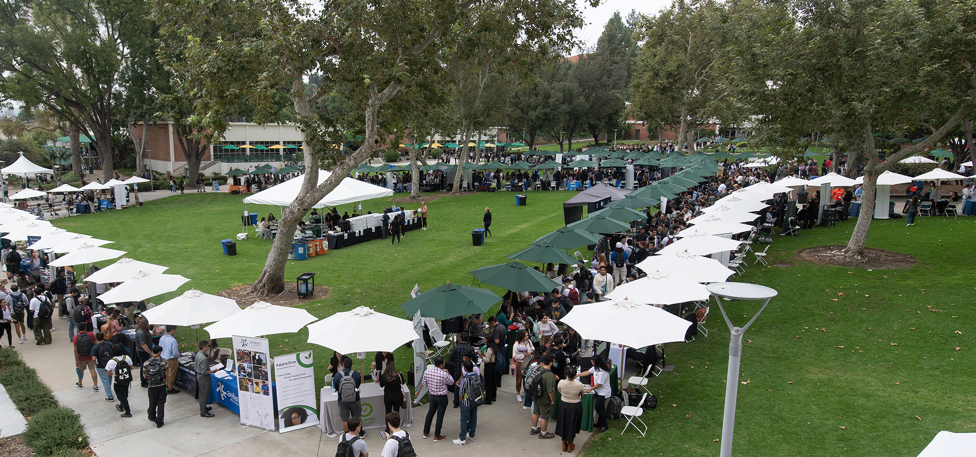 Tables set up in the university quad for the 2023 career fair. 