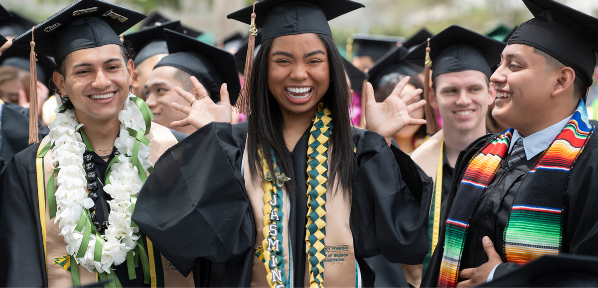 Cheerful graduates at commencement ceremony