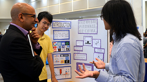 students present their research poster