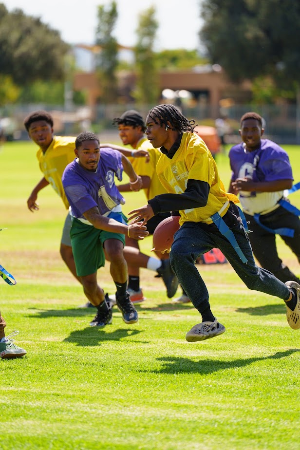 Students play a game of flag football