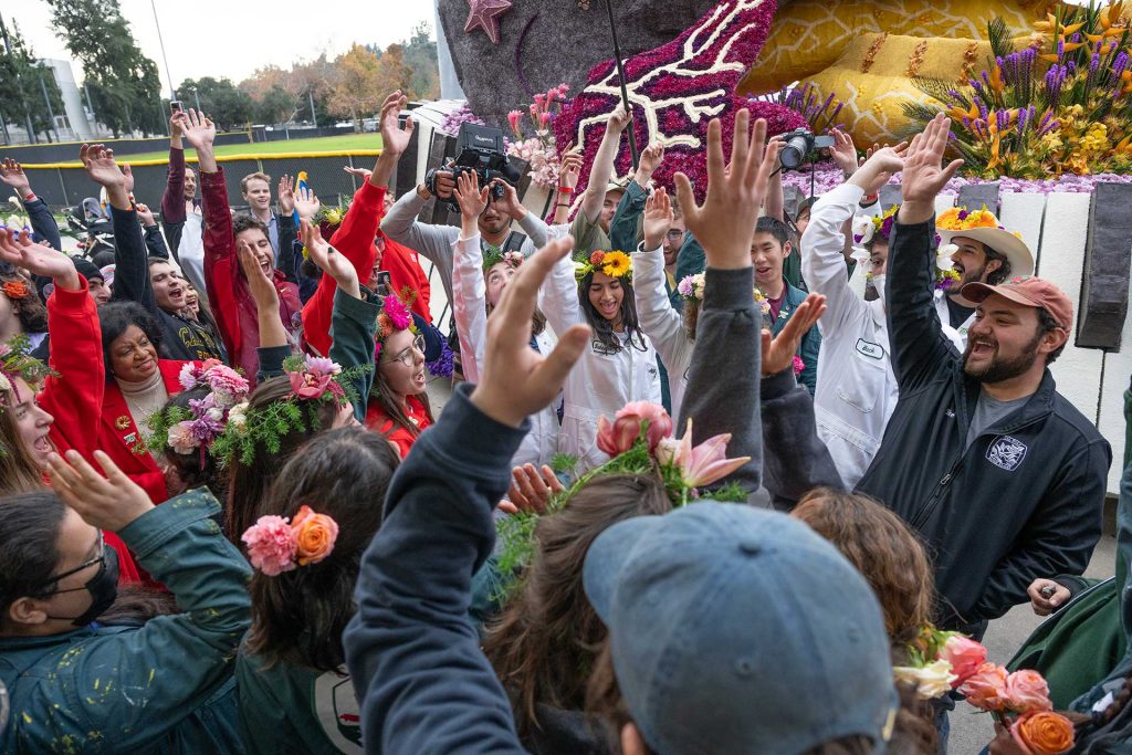 Students pose with the Rose Float judges.