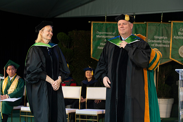 Ruth and David Singelyn receive their honorary doctorates