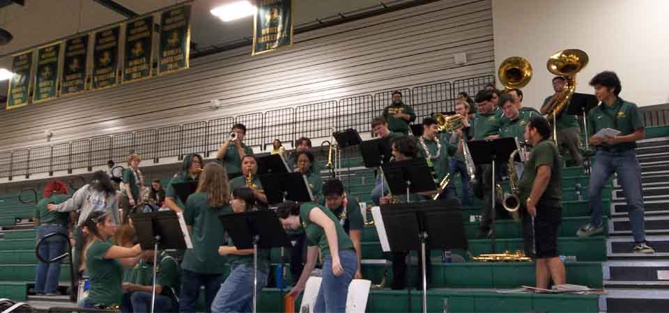 Pep Band members taking a break during a basketball game