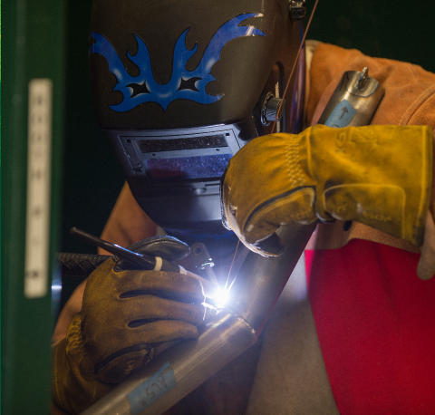 person welding