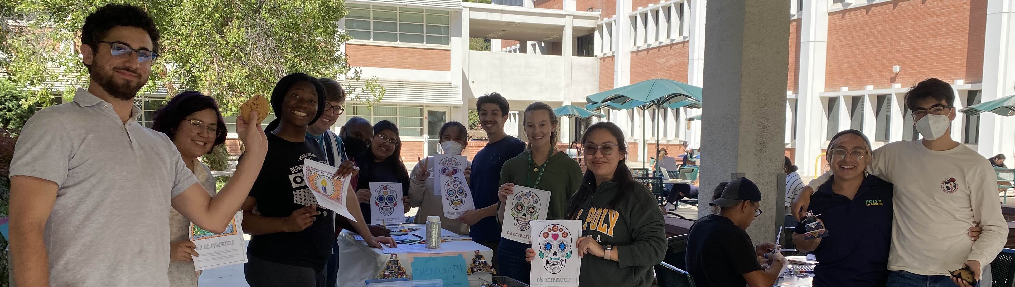 Chemunity group doing crafts at Dia de los Muertos event in 2022