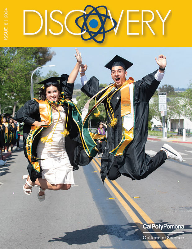 cover of the 2024 discovery magazine showing two students jumping