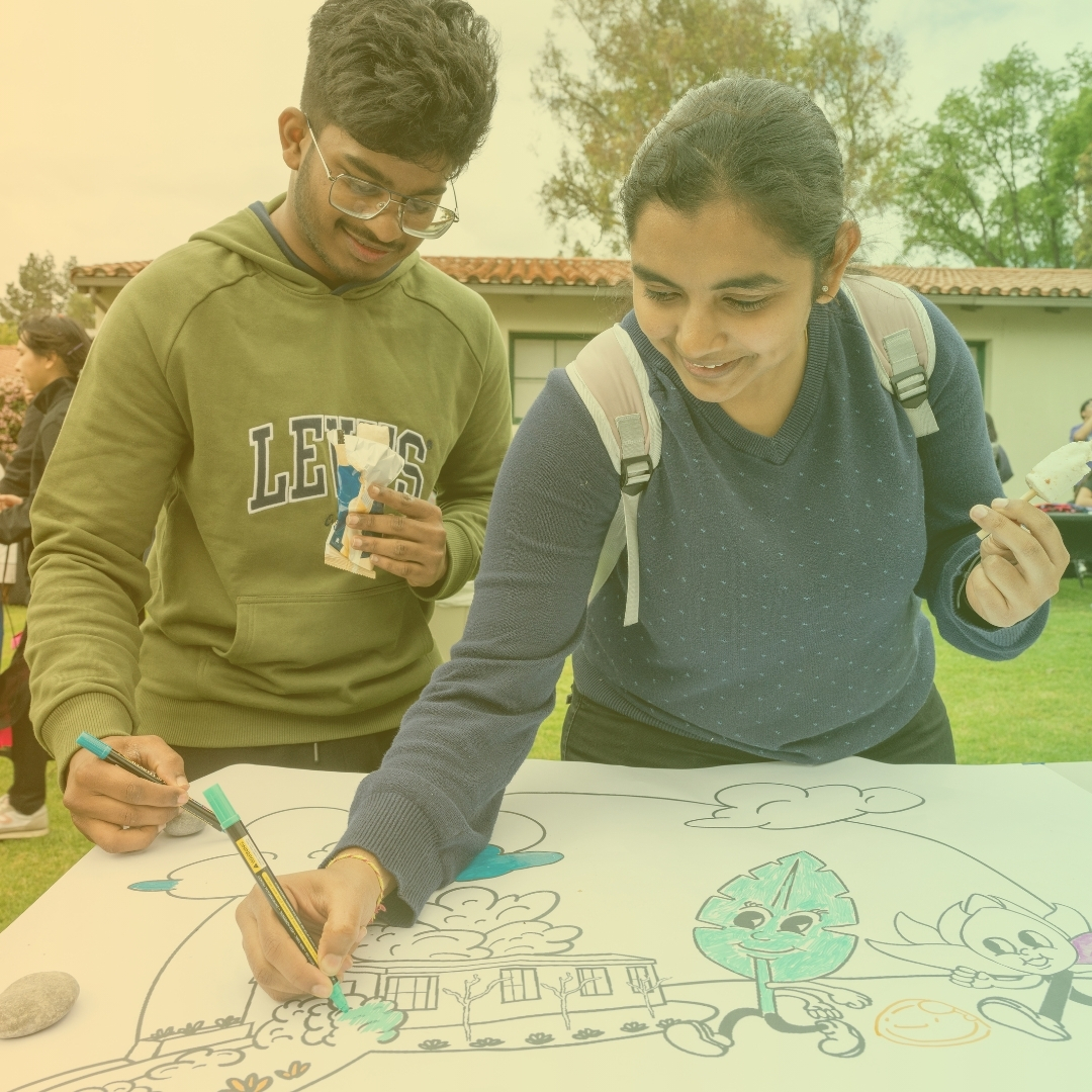 Students draw at an event