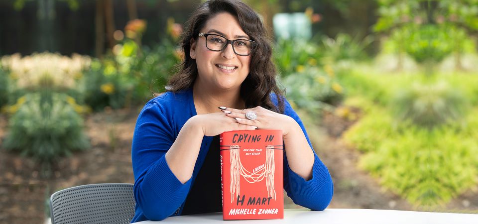 Jacqueline Naranjo holds Crying in H Mart book